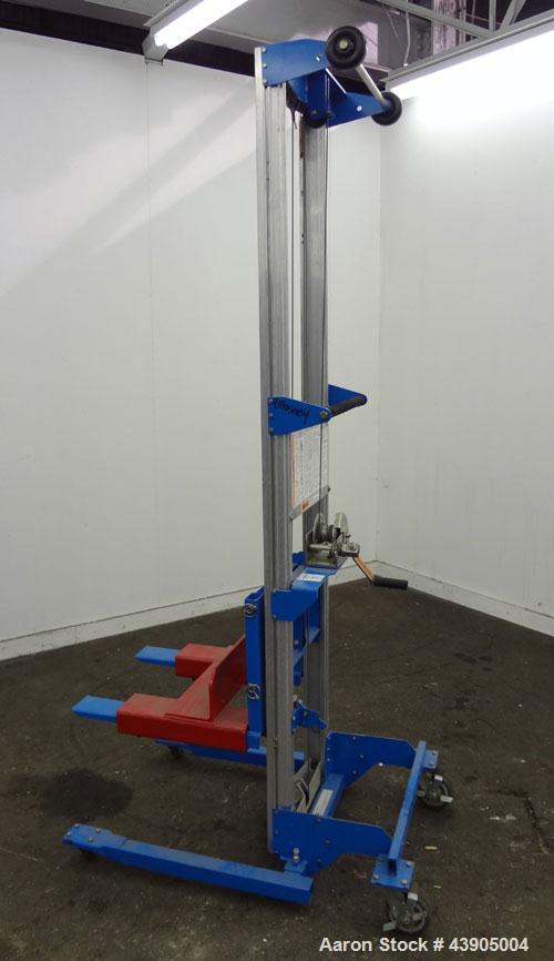 Used Genie GL Lift. 350 Pound lifting capacity. Aluminum and carbon steel frame with casters.	