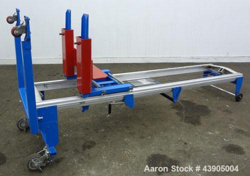 Used Genie GL Lift. 350 Pound lifting capacity. Aluminum and carbon steel frame with casters.	