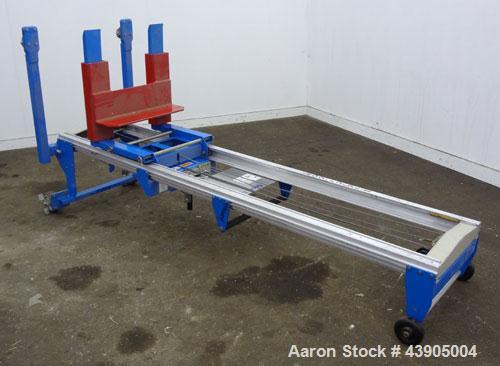 Used Genie GL Lift. 350 Pound lifting capacity. Aluminum and carbon steel frame with casters.	