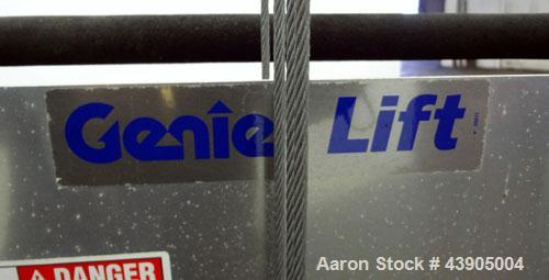 Used Genie GL Lift. 350 Pound lifting capacity. Aluminum and carbon steel frame with casters.	