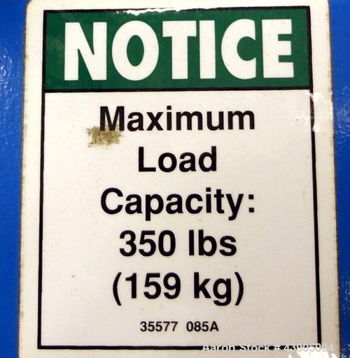 Used Genie GL Lift. 350 Pound lifting capacity. Aluminum and carbon steel frame with casters.	