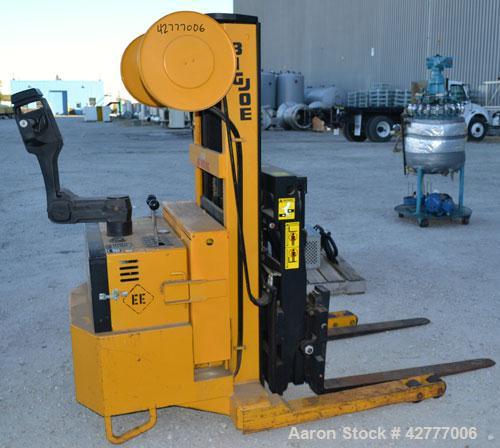 Used Big Joe Electric Walk Behind Reach Truck, Model PDR-20-106. Lifting capacity 2000 pounds at 24’’ center. Lift range 106’’, turning radius from 65’’. Lift speed empty 15’ per minute, loaded 10’ p...