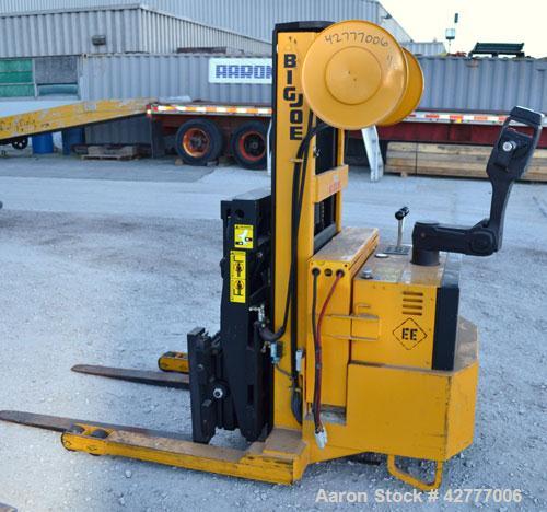 Used Big Joe Electric Walk Behind Reach Truck, Model PDR-20-106. Lifting capacity 2000 pounds at 24’’ center. Lift range 106’’, turning radius from 65’’. Lift speed empty 15’ per minute, loaded 10’ p...