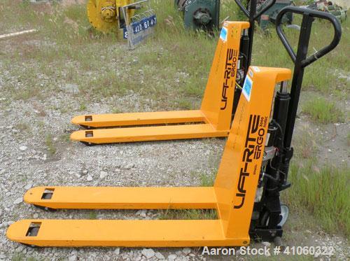Used Lift-Rite Ergonomic 3000 12 Volt Electric/Manual Portable Scissor Lift, Model RG30E, Carbon Steel. 3000 pound capacity. Fork Width 20.5’’, Fork Length 48’’, Lowered Height 3.25’’, Raised Height ...