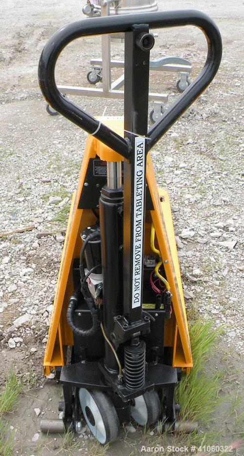 Used Lift-Rite Ergonomic 3000 12 Volt Electric/Manual Portable Scissor Lift, Model RG30E, Carbon Steel. 3000 pound capacity. Fork Width 20.5’’, Fork Length 48’’, Lowered Height 3.25’’, Raised Height ...