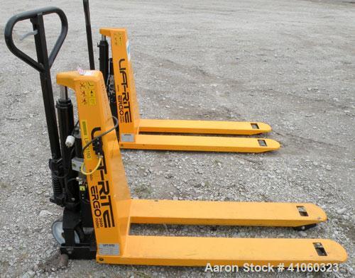 Used Lift-Rite Ergonomic 3000 12 Volt Electric/Manual Portable Scissor Lift, model RG30E, carbon steel. 3000 pound capacity. Fork width 20.5’’, fork length 48’’,lowered height 3.25’’, raised height 3...