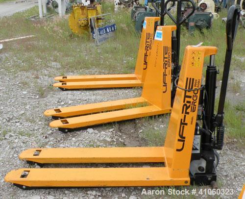 Used Lift-Rite Ergonomic 3000 12 Volt Electric/Manual Portable Scissor Lift, model RG30E, carbon steel. 3000 pound capacity. Fork width 20.5’’, fork length 48’’,lowered height 3.25’’, raised height 3...