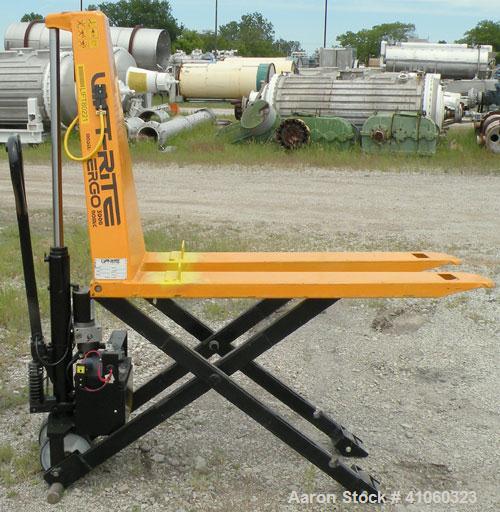 Used Lift-Rite Ergonomic 3000 12 Volt Electric/Manual Portable Scissor Lift, model RG30E, carbon steel. 3000 pound capacity. Fork width 20.5’’, fork length 48’’,lowered height 3.25’’, raised height 3...