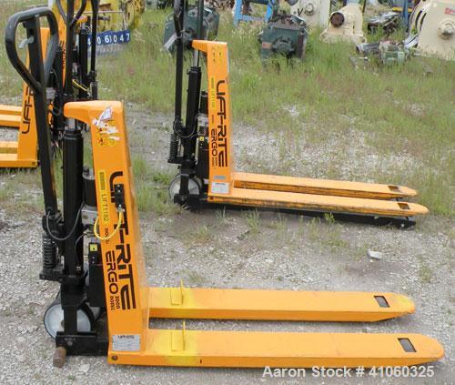 Used Lift-Rite Ergonomic 3000 12 Volt Electric/Manual Portable Scissor Lift, Model RG30E, Carbon Steel. 3000 pound capacity. Fork Width 20.5’’, Fork Length 48’’, Lowered Height 3.25’’, Raised Height ...