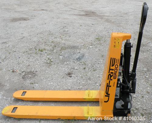 Used Lift-Rite Ergonomic 3000 12 Volt Electric/Manual Portable Scissor Lift, Model RG30E, Carbon Steel. 3000 pound capacity. Fork Width 20.5’’, Fork Length 48’’, Lowered Height 3.25’’, Raised Height ...