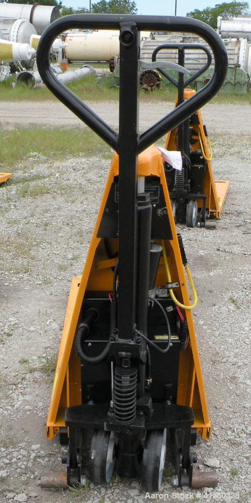 Used Lift-Rite Ergonomic 3000 12 Volt Electric/Manual Portable Scissor Lift, Model RG30E, Carbon Steel. 3000 pound capacity. Fork Width 20.5’’, Fork Length 48’’, Lowered Height 3.25’’, Raised Height ...