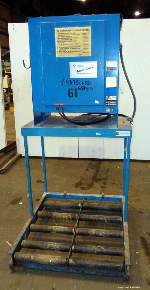 Used Raymond Corporation Stand Up Electric Reach Lift Truck, Model 20-R30TT. 3000 Pound capacity at 190” lift height. (2) Stage mast. Includes a Gould 24 volt battery charger, model GFC-12-900T1. Hou...