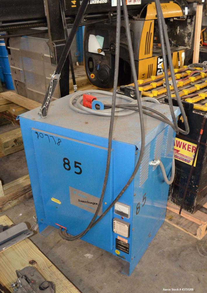 Used Raymond Corporation Stand Up Electric Reach Lift Truck, Model 20-R30TT. 3000 Pound capacity at 190” lift height. (2) Stage mast. Includes a Gould 24 volt battery charger, model GFC-12-900T1. Hou...