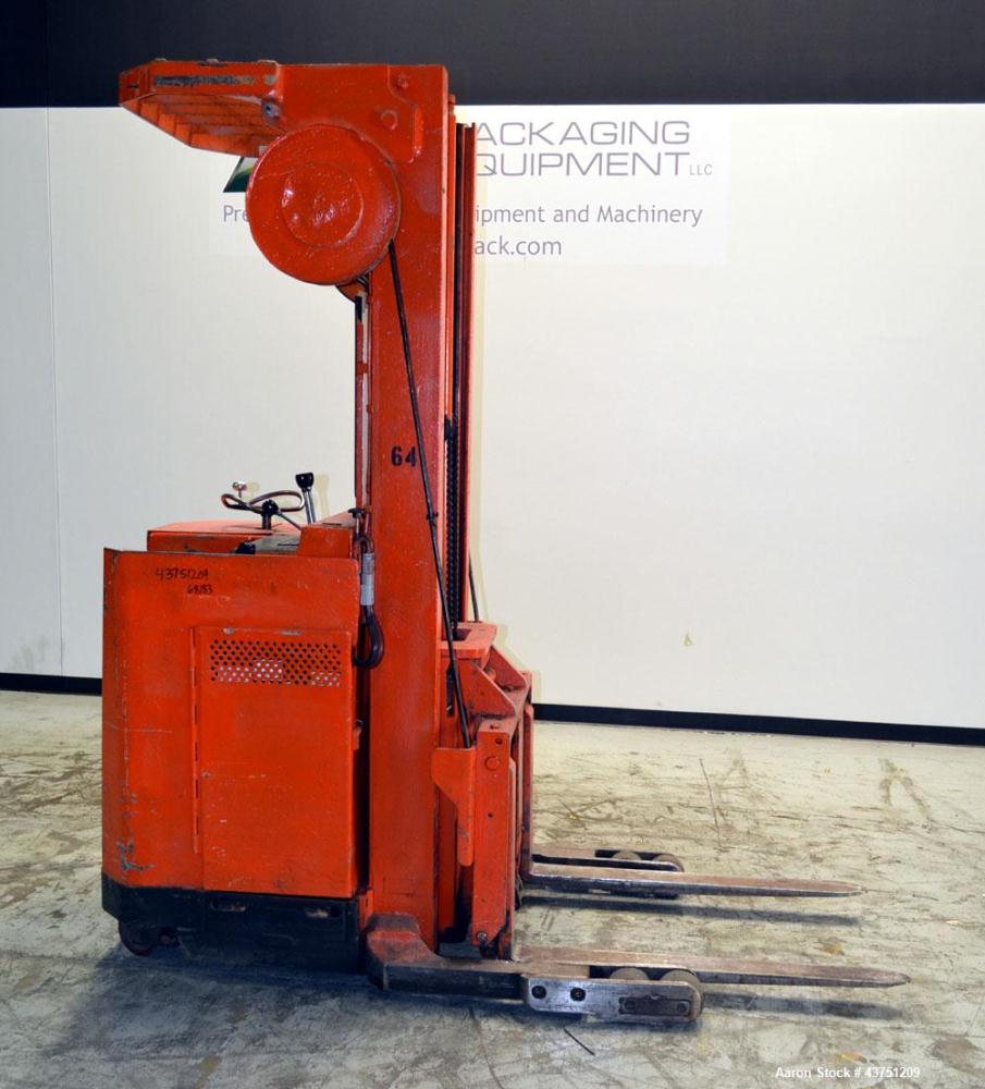 Used Raymond Corporation Stand Up Electric Reach Lift Truck, Model 20-R30TT. 3000 Pound capacity at 190” lift height. (2) Stage mast. Includes a Gould 24 volt battery charger, model GFC-12-900T1. Hou...