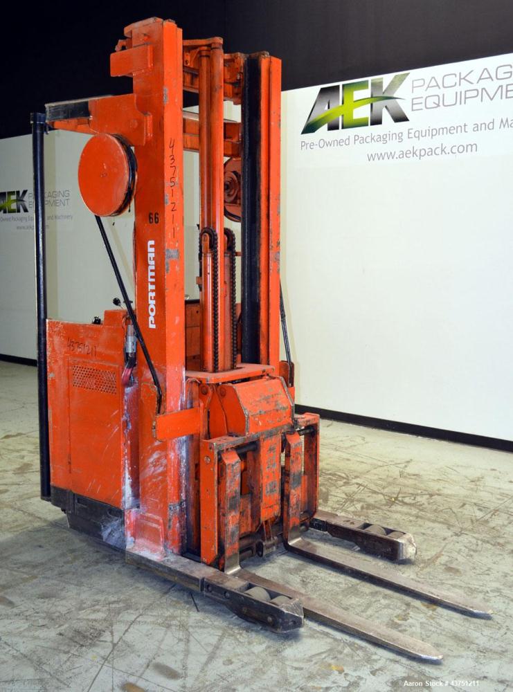 Used Raymond Corporation Stand Up Electric Reach Lift Truck, Model 20-R30TT. 3000 Pound capacity at 190” lift height. (2) Stage mast. Includes a Gould 24 volt battery charger, model GFC-12-900T1.