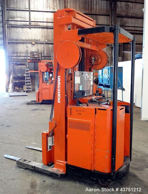 Used Raymond Corporation Stand Up Electric Reach Lift Truck, Model 20-R30TT. 3000 Pound capacity at 190” lift height. (2) Stage mast. Includes a Gould 24 volt battery charger, model GFC-12-900T1. Hou...