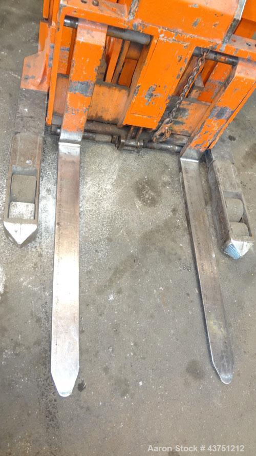 Used Raymond Corporation Stand Up Electric Reach Lift Truck, Model 20-R30TT. 3000 Pound capacity at 190” lift height. (2) Stage mast. Includes a Gould 24 volt battery charger, model GFC-12-900T1. Hou...