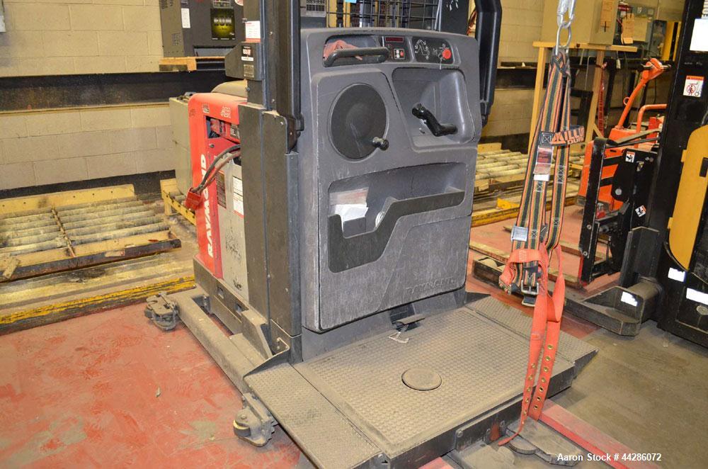 Used Raymond Model 550-0PC30TT, 3,000 Pound Capacity Electric Stand Up Riding Cherry Picker Style Lift 3,000 Pound Capacity Electric Stand Up Riding Cherry Picker Style Lift, 315 in Maximum Elevation...
