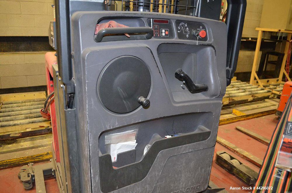 Used Raymond Model 550-0PC30TT, 3,000 Pound Capacity Electric Stand Up Riding Cherry Picker Style Lift 3,000 Pound Capacity Electric Stand Up Riding Cherry Picker Style Lift, 315 in Maximum Elevation...