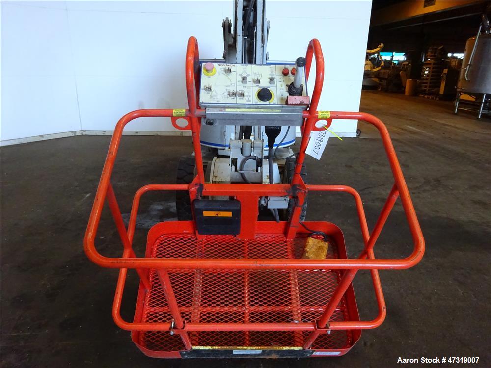 Used SkyJack Articulated Boom Lift, Model SJK8-33W.