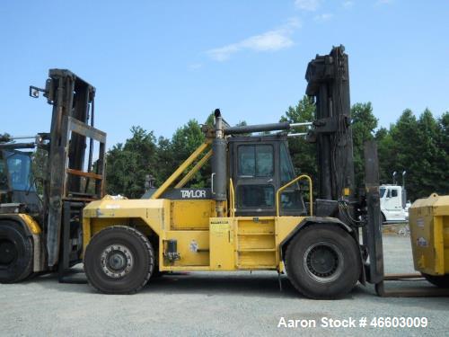 Used Taylor T450M. 45,000 lb. at 36" load center, built 2001. 212" Lift with 5-way valve. Independent fork positioner, sideshifter 8' forks. Full cab with heat and AC. Good tires, straight unit.