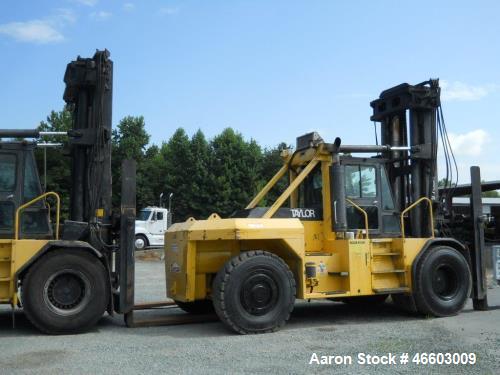 Used Taylor T450M. 45,000 lb. at 36" load center, built 2001. 212" Lift with 5-way valve. Independent fork positioner, sideshifter 8' forks. Full cab with heat and AC. Good tires, straight unit.