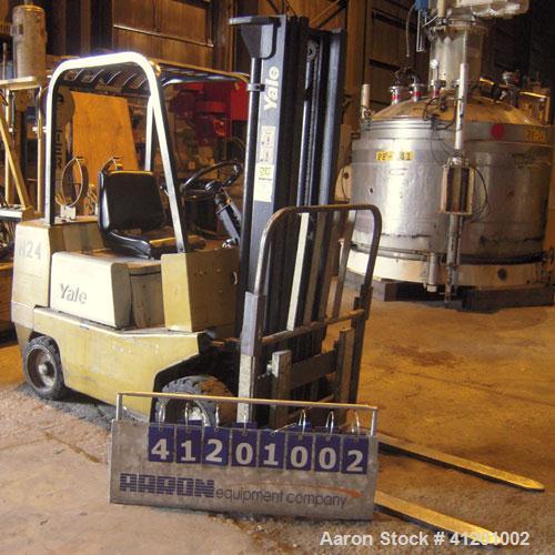 Used Yale Lift Truck, Model GLC040ADJUAE083, 4000 lb capacity. Triple mast with 5 degree backtilt, solid tire. (2) 42" long forks. Runs on propane gas.