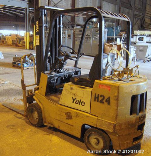Used Yale Lift Truck, Model GLC040ADJUAE083, 4000 lb capacity. Triple mast with 5 degree backtilt, solid tire. (2) 42" long forks. Runs on propane gas.