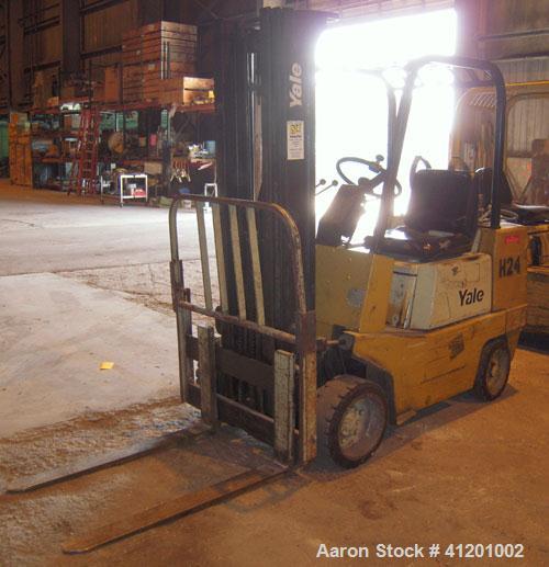 Used Yale Lift Truck, Model GLC040ADJUAE083, 4000 lb capacity. Triple mast with 5 degree backtilt, solid tire. (2) 42" long forks. Runs on propane gas.
