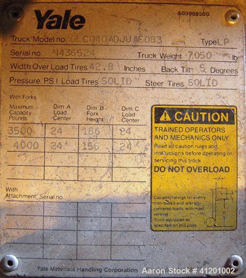 Used Yale Lift Truck, Model GLC040ADJUAE083, 4000 lb capacity. Triple mast with 5 degree backtilt, solid tire. (2) 42" long forks. Runs on propane gas.