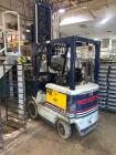 Used Komatsu FB 20SH-4 Counterbalanced, Cushion Tire, 4 Wheel Sit Down Electric Forklift, 3680 lb Load Capacity, Serial # 030001A.  (Reportedly works but battery will not hold charge)
