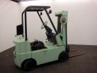 Used Hyster Lift Truck, Model S40F, 4000 Pound Capacity. Double mast, (2) 41-1/2” long  X 4” wide forks. Solid tire, runs on gas. Missing engine cover, and seat.