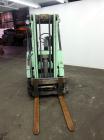 Used Hyster Lift Truck, Model S40F, 4000 Pound Capacity. Double mast, (2) 41-1/2” long  X 4” wide forks. Solid tire, runs on gas. Missing engine cover, and seat.