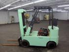 Used Hyster Lift Truck, Model S40F, 4000 Pound Capacity. Double mast, (2) 41-1/2” long  X 4” wide forks. Solid tire, runs on gas. Missing engine cover, and seat.