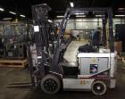 Used Nissan Electric Fork Lift/Truck, Model CP1B2L25S. 9385 hours. Maximum 3450 lbs capacity. 42