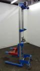 Used Genie GL Lift. 350 Pound lifting capacity. Aluminum and carbon steel frame with casters.	