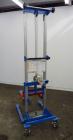 Used Genie GL Lift. 350 Pound lifting capacity. Aluminum and carbon steel frame with casters.	