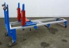 Used Genie GL Lift. 350 Pound lifting capacity. Aluminum and carbon steel frame with casters.	