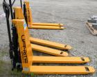 Used Lift-Rite Ergonomic 3000 12 Volt Electric/Manual Portable Scissor Lift, Model RG30E, Carbon Steel. 3000 pound capacity. Fork Width 20.5’’, Fork Length 48’’, Lowered Height 3.25’’, Raised Height ...