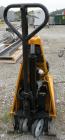 Used Lift-Rite Ergonomic 3000 12 Volt Electric/Manual Portable Scissor Lift, model RG30E, carbon steel. 3000 pound capacity. Fork width 20.5’’, fork length 48’’,lowered height 3.25’’, raised height 3...