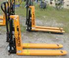 Used Lift-Rite Ergonomic 3000 12 Volt Electric/Manual Portable Scissor Lift, Model RG30E, Carbon Steel. 3000 pound capacity. Fork Width 20.5’’, Fork Length 48’’, Lowered Height 3.25’’, Raised Height ...
