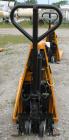 Used Lift-Rite Ergonomic 3000 12 Volt Electric/Manual Portable Scissor Lift, Model RG30E, Carbon Steel. 3000 pound capacity. Fork Width 20.5’’, Fork Length 48’’, Lowered Height 3.25’’, Raised Height ...