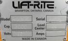 Used- Lift-Rite Ergonomic 3000 12 Volt Electric/Manual Portable Scissor Lift, Model RG30E, Carbon Steel. 3000 pound capacity...