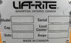 Used Lift-Rite Ergonomic 3000 12 Volt Electric/Manual Portable Scissor Lift, Model RG30E, Carbon Steel. 3000 pound capacity. Fork Width 20.5’’, Fork Length 48’’, Lowered Height 3.25’’, Raised Height ...