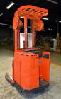 Used Raymond Corporation Stand Up Electric Reach Lift Truck, Model 20-R30TT. 3000 Pound capacity at 190” lift height. (2) Stage mast. Includes a Gould 24 volt battery charger, model GFC-12-900T1. Hou...