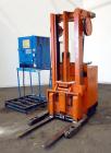 Used Raymond Corporation Stand Up Electric Reach Lift Truck, Model 20-R30TT. 3000 Pound capacity at 190” lift height. (2) Stage mast. Includes a Gould 24 volt battery charger, model GFC-12-900T1. Hou...