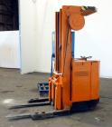 Used Raymond Corporation Stand Up Electric Reach Lift Truck, Model 20-R30TT. 3000 Pound capacity at 190” lift height. (2) Stage mast. Includes a Gould 24 volt battery charger, model GFC-12-900T1. Hou...