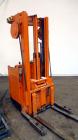 Used Raymond Corporation Stand Up Electric Reach Lift Truck, Model 20-R30TT. 3000 Pound capacity at 190” lift height. (2) Stage mast. Includes a Gould 24 volt battery charger, model GFC-12-900T1. Hou...
