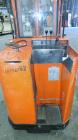 Used Raymond Corporation Stand Up Electric Reach Lift Truck, Model 20-R30TT. 3000 Pound capacity at 190” lift height. (2) Stage mast. Includes a Gould 24 volt battery charger, model GFC-12-900T1. Hou...