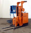 Used Raymond Corporation Stand Up Electric Reach Lift Truck, Model 20-R30TT. 3000 Pound capacity at 190” lift height. (2) Stage mast. Includes a Gould 24 volt battery charger, model GFC-12-900T1. Hou...